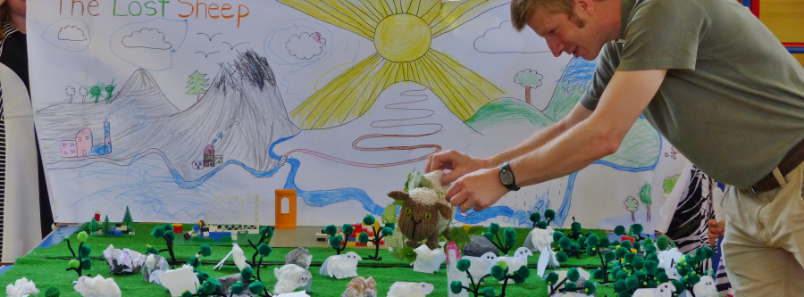 Rev Adrian Miller leading a Lost Sheep activity with children